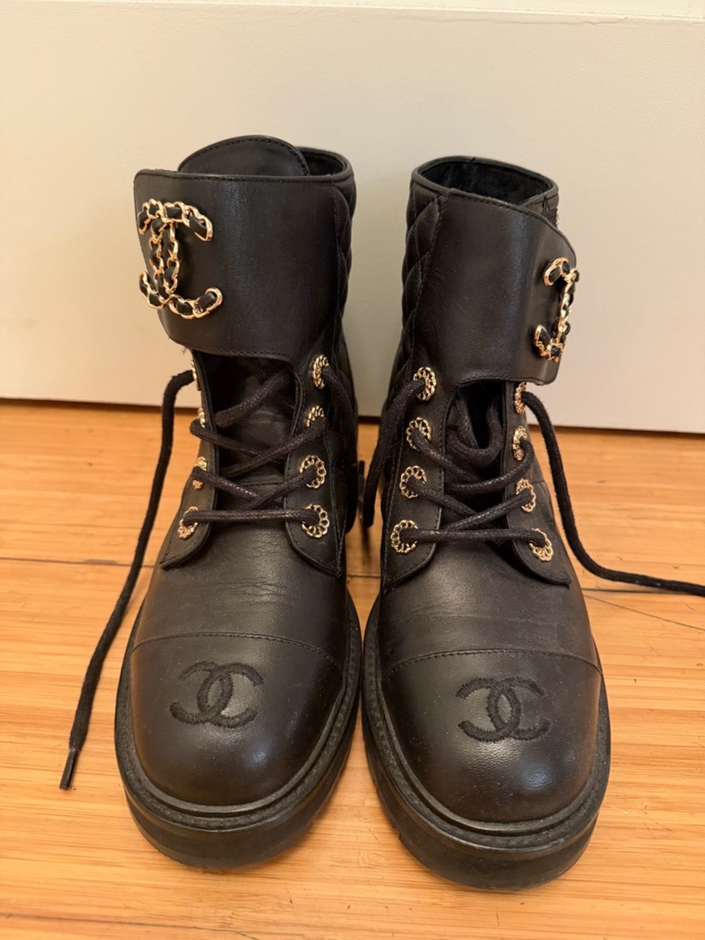 CHANEL Black Leather Quilted Ankle Boots with Gold Chain Accents - Picture 6 of 7